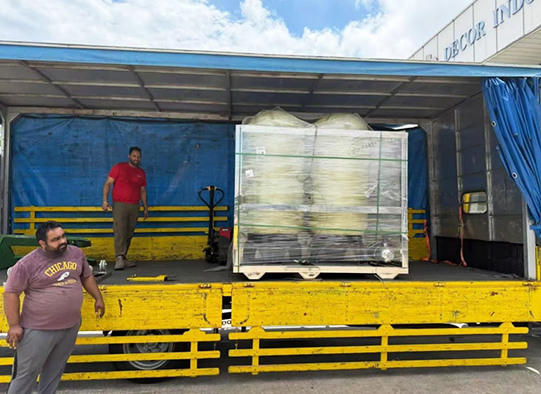 Photos of a Kenyan distributor receiving and installing custom industrial water treatment equipment